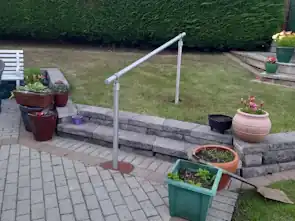 Paving and Tubular steel handrail on steps Bangor