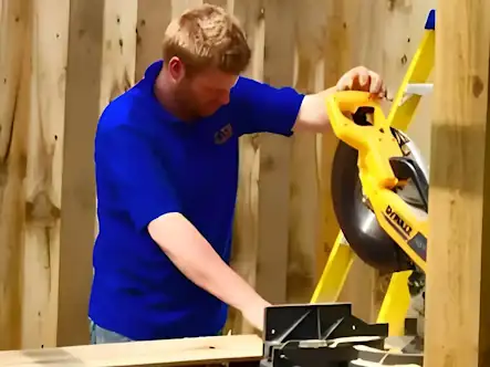 Richard Kinsella of RK Joinery and Building using a Dewalt Cross Cut Saw